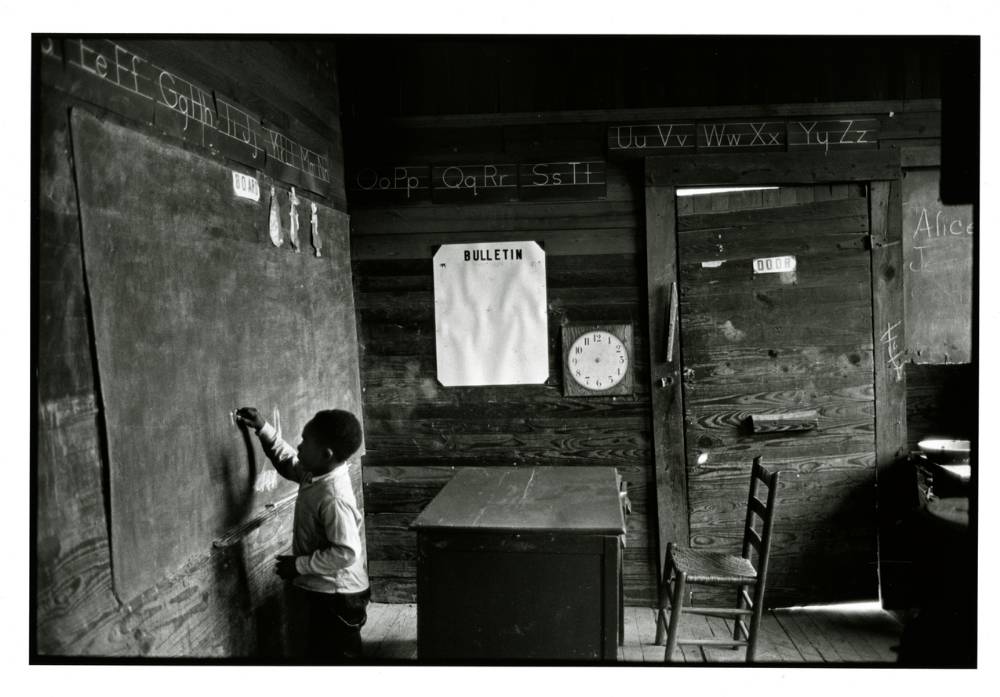 STUDENT AT A SEGREGATED SCHOOL   COURTESY OF BRUCE DAVIDSON / JCM COLLECTION 